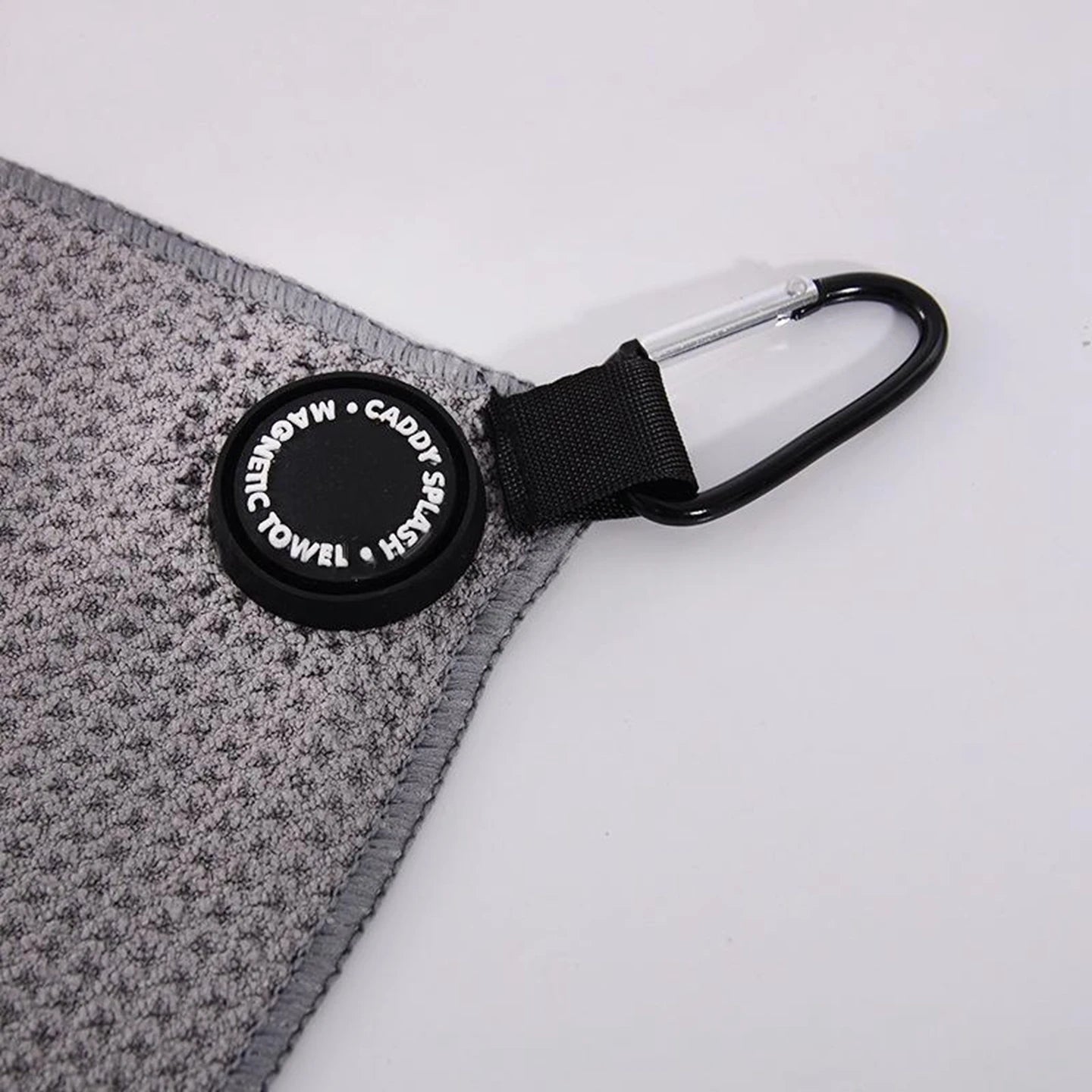 Waffle golf towel with magnetic attachment