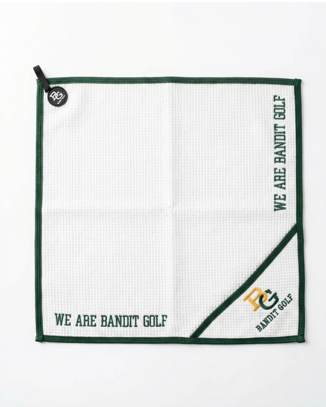 Bandit golf towel with ball cleaning pocket