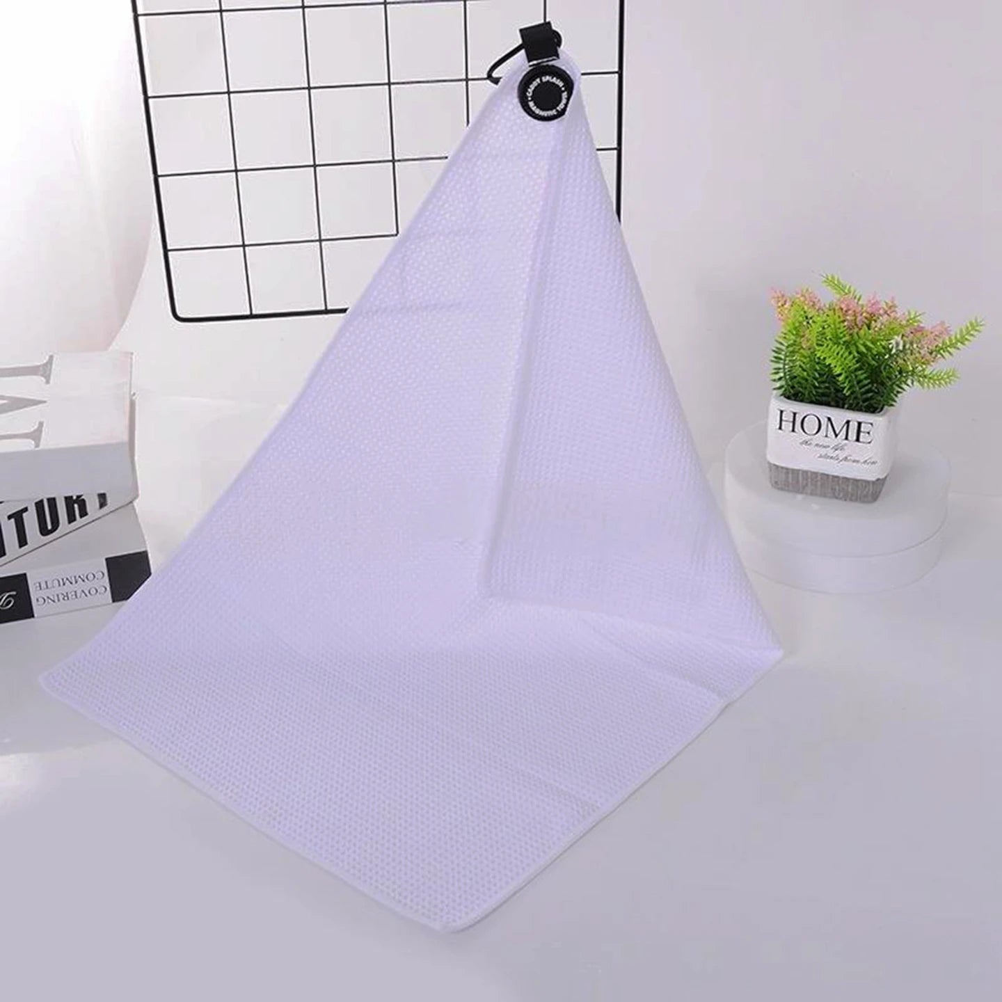 Waffle golf towel with magnetic attachment