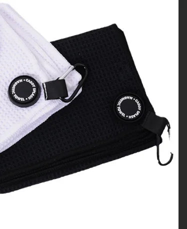 Waffle golf towel with magnetic attachment